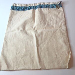 Tory Burch Cream Dustbag with blue accent fabric. Linen look. Gold tone charm